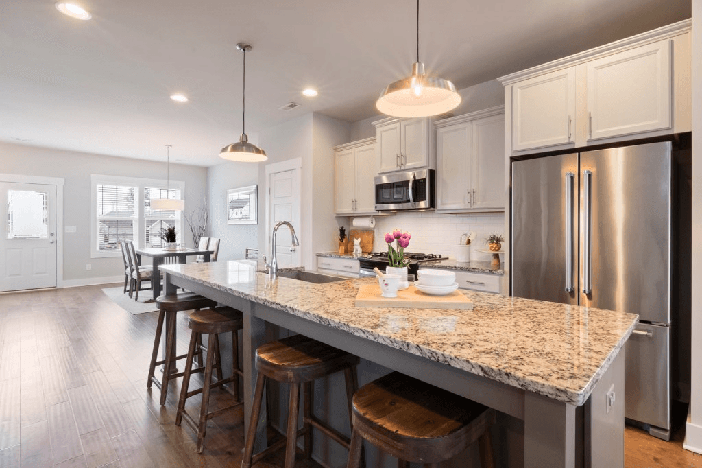 Spotless modern kitchen with clean countertops and stainless appliances